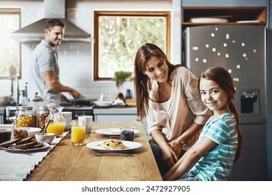 Portrait, breakfast pancakes and happy girl with family, mother and father, bonding and prepare ingredients. Morning food, cooking and hungry woman, man and daughter in home kitchen eating meal - Powered by Shutterstock