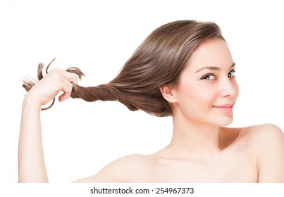 Portrait Of A Brunette Beauty With Strong Healthy Hair.