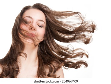 Portrait of a brunette beauty with strong healthy hair.