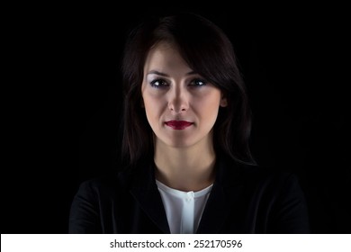 Portrait Of Brunette Business Woman On Black Background