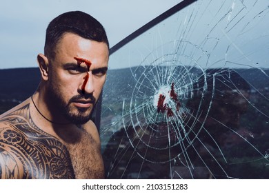 Portrait Of Brutal Man With Serious Bloody Face. Gang Guy. Spooky Criminal Person.