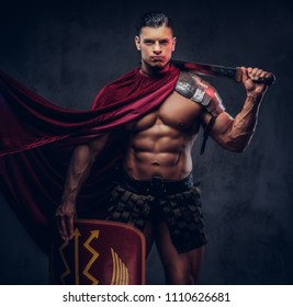 Portrait of a brutal Roman legionary in battle uniforms - Shutterstock ID 1110626681