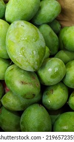 Portrait Bunch Of Fresh And Ripe Honey Mangoes In A Fruit Basket Ready To Be Sold In The Market.