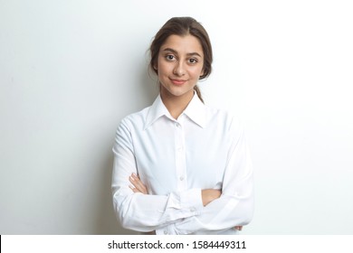 Portrait of a business Indian woman on a white background. Smiling girl student.