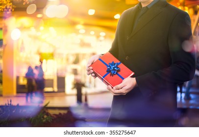 Portrait Of Business Man - Giving The Gift