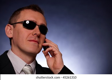 Portrait Of Business Man, Politician, Body Guard Or Politician With Mobile Phone