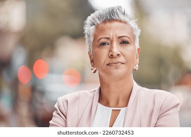 Portrait, business and old woman outdoor, serious and confident leader, urban and skills. Face, female manager and entrepreneur outside, assertive and plan for sales growth, ceo in city and formal - Powered by Shutterstock