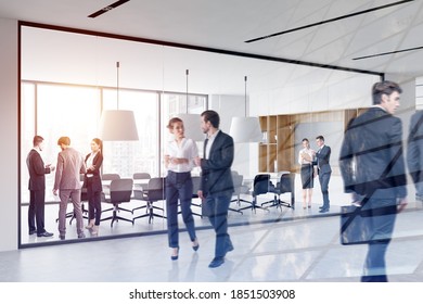 Portrait Of Business People Working Together In Blurry Office. Concept Of Teamwork. Toned Image Double Exposure