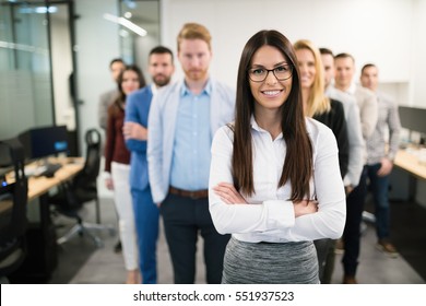 Portrait of business woman in offices representing company