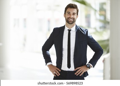 Portrait Of Businessman In Confident Pose