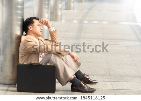 Portrait Businessman feeling despair after business failure and feeling hopeless, distraught, sad and discouraged in life. Business Stress Failed Unsuccessful Concept.