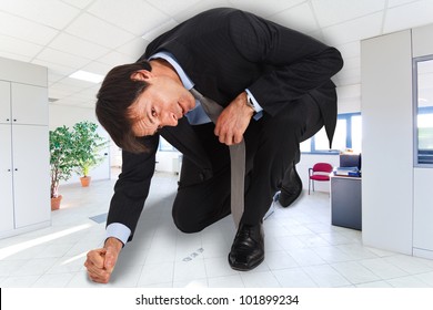 Portrait Of Businessman In A Small Office