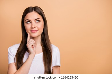 Portrait Of Candid Pretty Charming Youth Girl Look Copyspace Think Thoughts About Summer Weekends Wear Modern Outfit Isolated Over Pastel Color Background