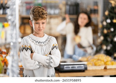 Portrait of capricious, offended boy whose mother forbade him to buy candy in the store