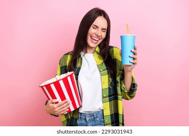 Portrait of carefree relaxed person long hairstyle wear plaid shirt laughing at funny scene in film isolated on pink color background