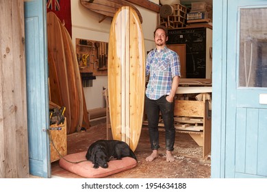 Portrait Of Carpenter Making Bespoke Surfboards In Workshop - Powered by Shutterstock