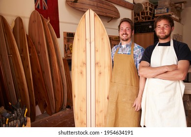 Portrait Of Carpenters Making Bespoke Surfboards In Workshop - Powered by Shutterstock