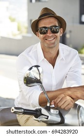 Portrait Of Casual Man In Hat And Sunglasses, Smiling