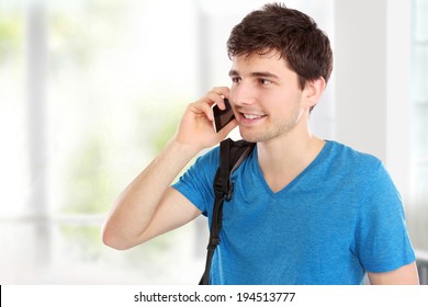 Portrait Of A Casual Young Man Speaking On The Phone