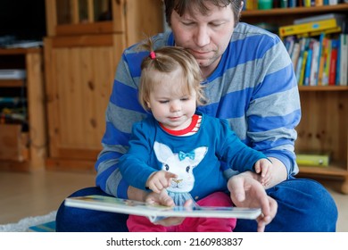 Portrait Of Caucasian Father Hold Story Book Reading With Daughter Little Girl. Home School Learn From Teacher, Education Happy Family Love Together, Bed Time Story Fathers Day Concept