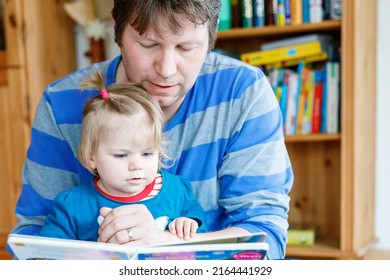 Portrait Of Caucasian Father Hold Story Book Reading With Daughter Little Girl. Home School Learn From Teacher, Education Happy Family Love Together, Bed Time Story Fathers Day Concept