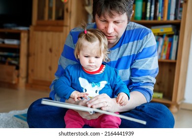 Portrait Of Caucasian Father Hold Story Book Reading With Daughter Little Girl. Home School Learn From Teacher, Education Happy Family Love Together, Bed Time Story Fathers Day Concept