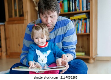 Portrait Of Caucasian Father Hold Story Book Reading With Daughter Little Girl. Home School Learn From Teacher, Education Happy Family Love Together, Bed Time Story Fathers Day Concept