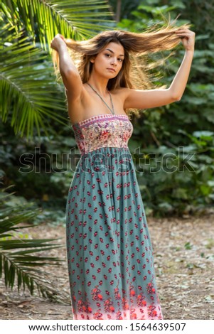 Portrait of Caucasian girl in the forest