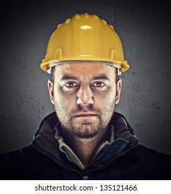 portrait of caucasian labor and grunge background