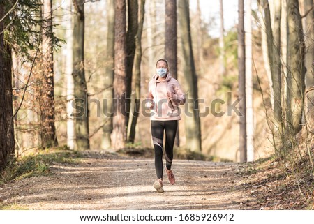 Similar – Image, Stock Photo Young man exercising outdoors in a forest