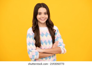 Portrait Of Caucasian Teen Girl With Arms Folded, Isolated On Yellow Background. Cute Teenager Child.