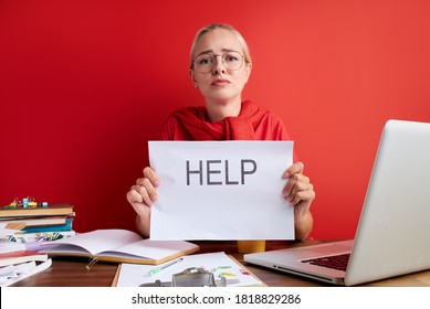 Portrait Of Caucasian Tired And Frustrated Woman Working As Secretary In Stress At Work Office Desk, Asking For Help In Business Frustration Concept. Isolated Red Background