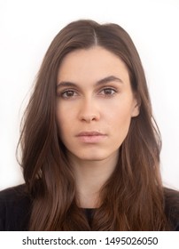 Portrait Of Caucasian Woman With No Expression. ID Or Passport Photo Full Collection Of Diverse Face And Expressions. Calm Interesting Woman In Black Shirt With Normal Face Expression