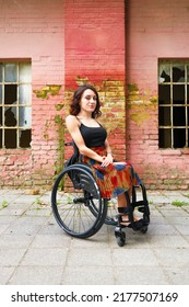 Portrait Of A Caucasian Woman In A Wheelchair With Resolute Stare. Strong Independent Woman.