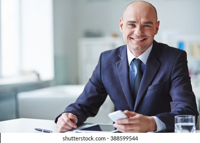 Portrait Of A Ceo Looking At Camera And Smiling
