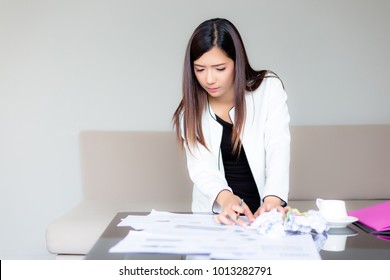 Portrait Charming Beautiful Professional Businesswoman: Attractive Woman Is Working On Messy Desk. Gorgeous Girl Look So Busy. She Feel Unhappy And Confused Of Her Work. Asian Female Get Stressed.