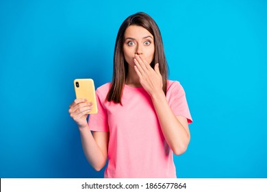 Portrait Of Charming Horrified Lady Arm Cover Mouth No Talk Secret Gossip Isolated On Blue Color Background