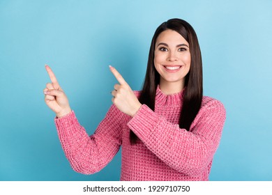 Portrait of charming positive lady toothy smile direct two hands fingers empty space isolated on blue color background