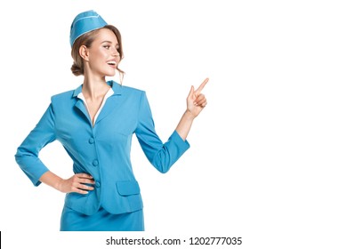Portrait of charming stewardess wearing in blue uniform. Isolated on white background.