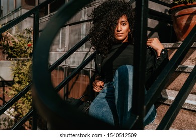 Portrait Charming Young African Woman with Curly Hair, Street Style, Posing Outdoors - Shutterstock ID 1540512509