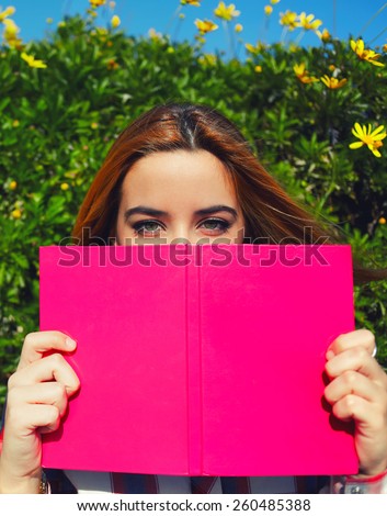 Similar – Image, Stock Photo Young redhead woman reading a red book