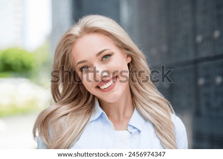 Portrait of cheerful adorable nice woman beautiful appearance sunny nice weather spring time outside