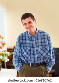Portrait Of Cheerful Adult Man With Disability In Rehabilitation Center