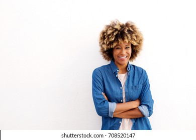 Portrait Of Cheerful African American Woman With Arms Crossed On White Background