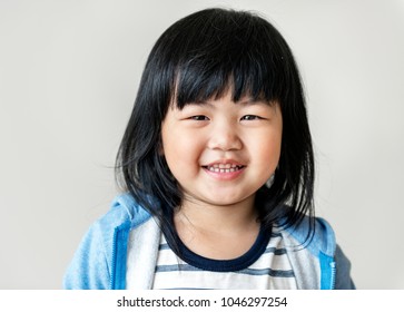 Portrait Of Cheerful Asian Girl