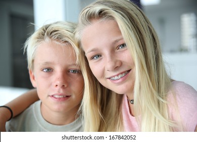 Portrait of cheerful boy and girl