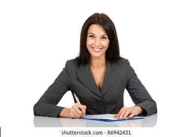 Portrait Of A Cheerful Business Woman Sitting On Her Desk Holding A Pen Working With Documents Sign Up Contract Isolated Over White Background