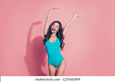 Portrait of cheerful cheery careless carefree luxury chic attractive adorable charming wavy-haired lady red lips rejoicing raising hands up isolated over pink background