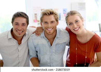 Portrait Of Cheerful Creative Team In Photo Agency