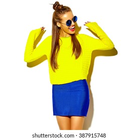 portrait of cheerful fashion hipster girl going crazy  in casual colorful hipster yellow summer clothes with red lips isolated on white